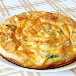 Пухкава баница с лапад и сирене